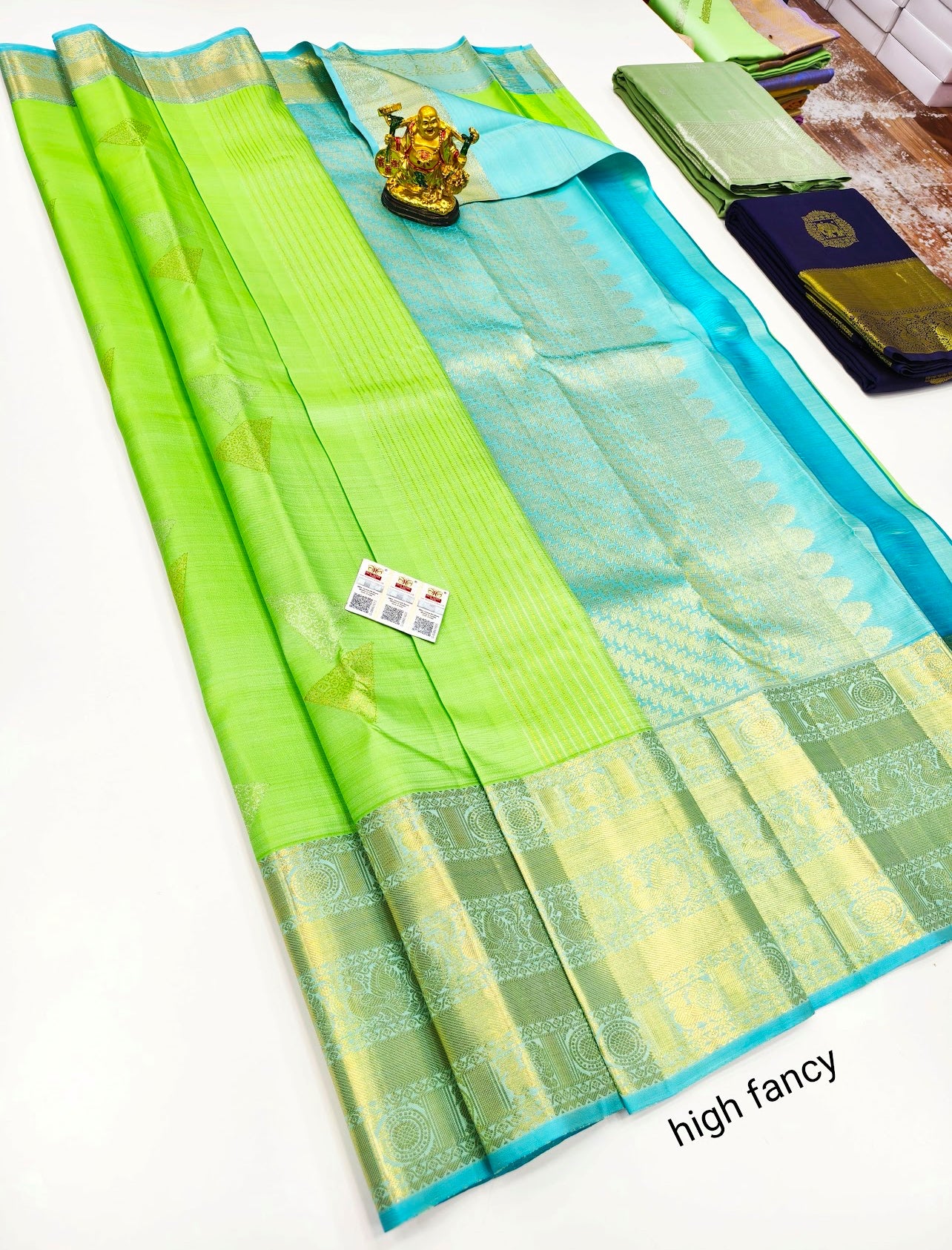 Graceful Luxury: Parrot Green Pure Soft Silk Saree with Light Blue Border & Golden Zari