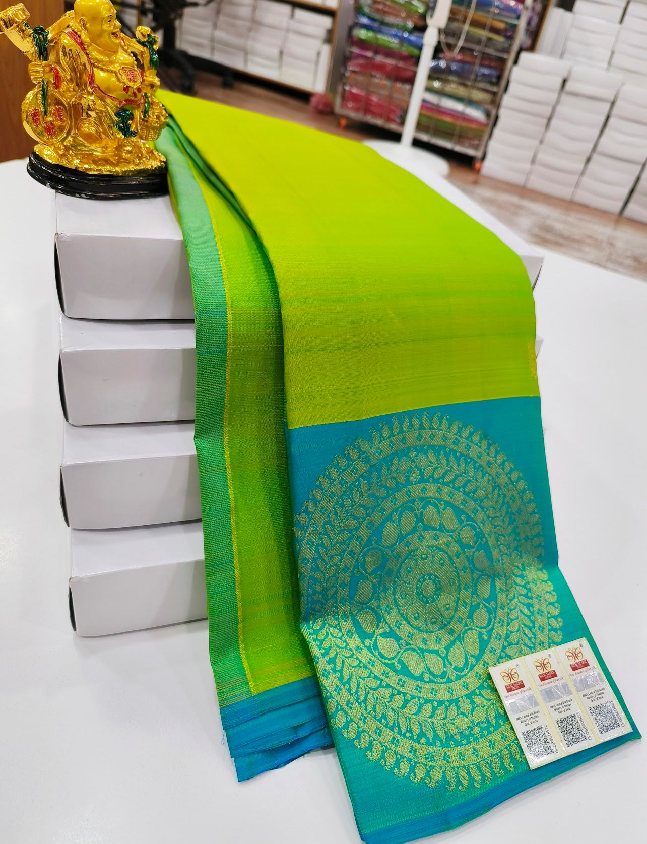 Enchanting Parrot Green Kanjipuram Pure Silk Saree with Regal Blue Zari Border – A Celebration of Tradition & Grandeur