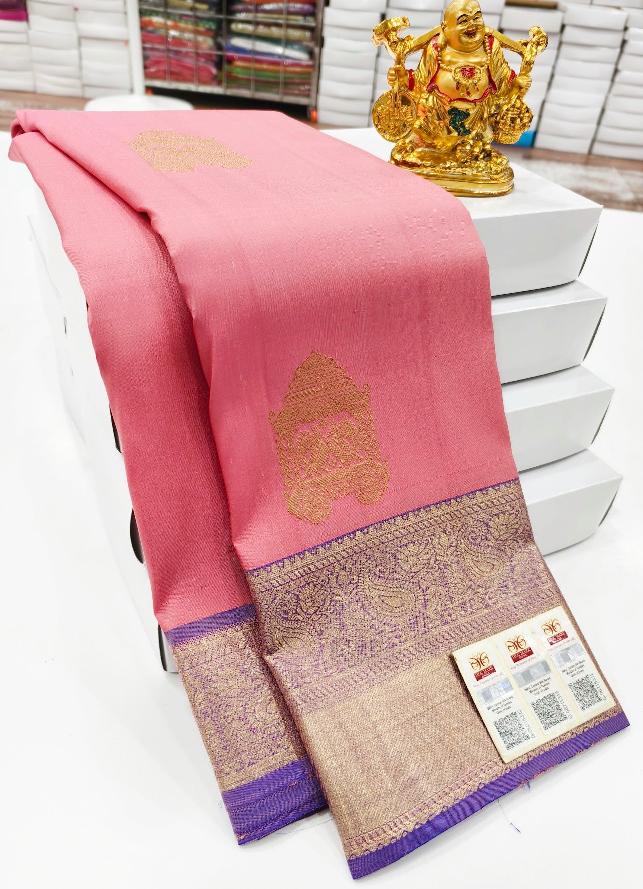 Ethereal Soft Light Pink Kanjipuram Pure Silk Saree with Temple Chariot Zari Patterns & Grand Purple Zari Border – A Timeless Treasure of Tradition